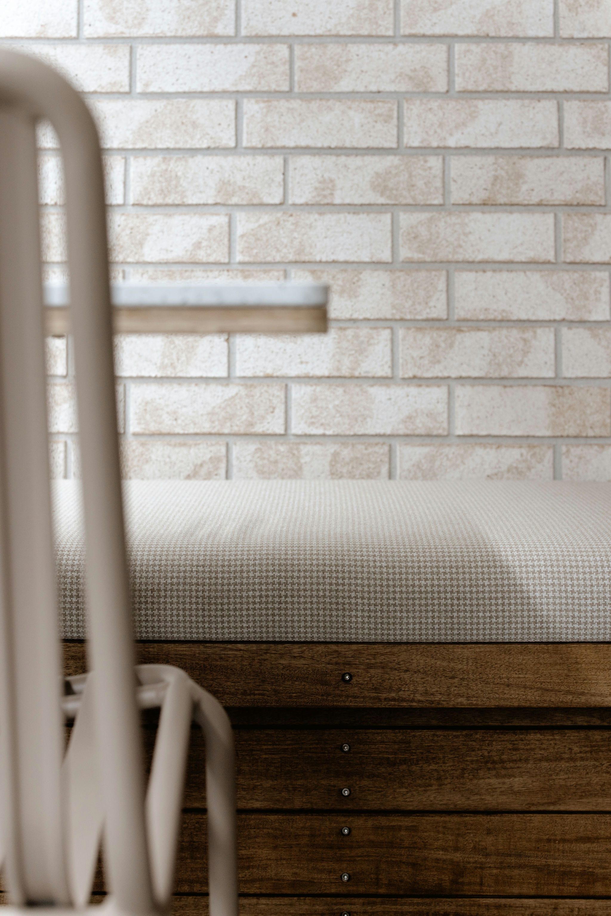 Close-up of exterior café seating with Vitex decking
