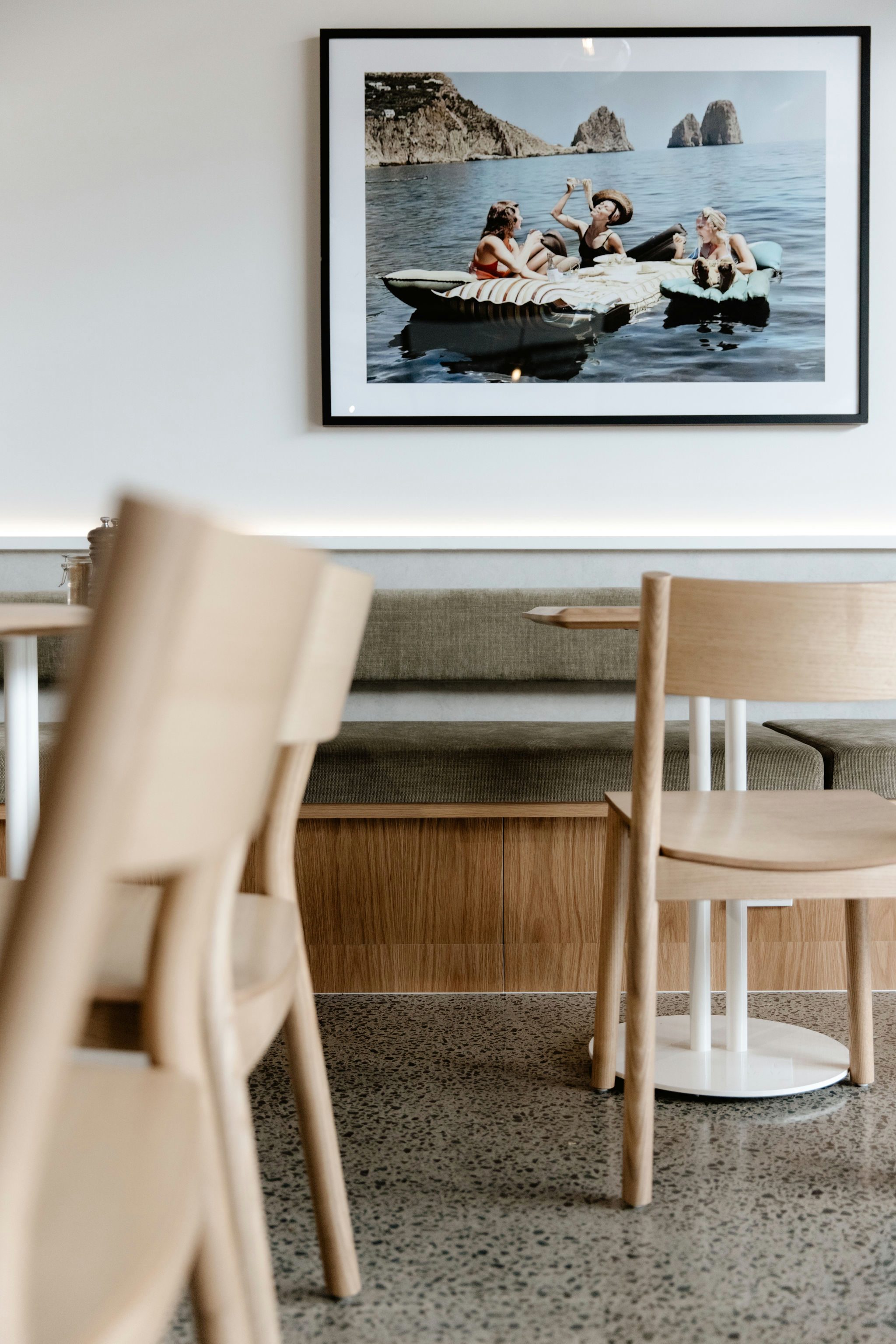 Custom oak base seat with hidden storage at Kinfolk Café, Long Bay