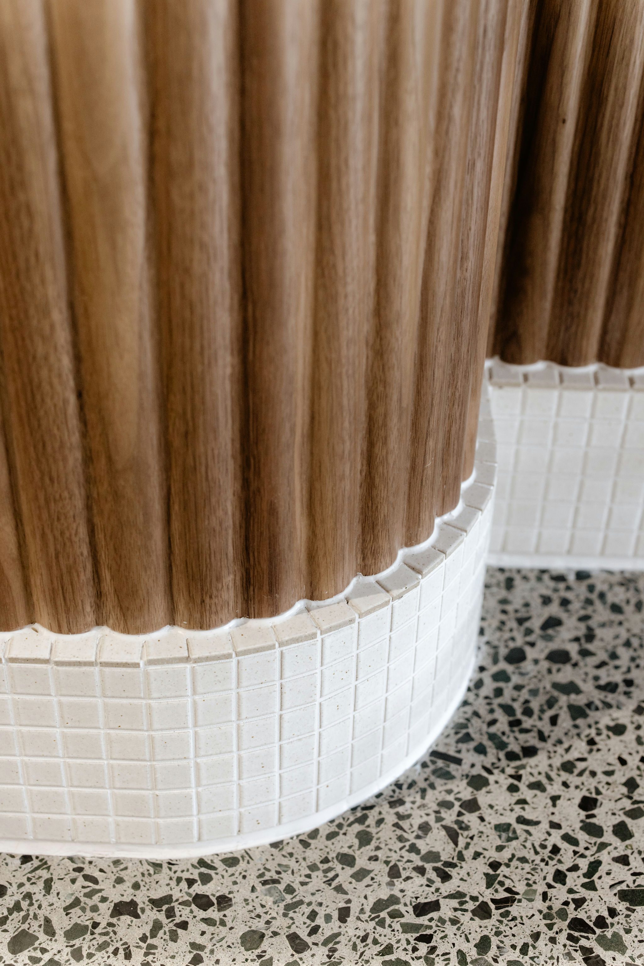 Close-up of 8mm Walnut Wave Flex panel detail at Kinfolk Café